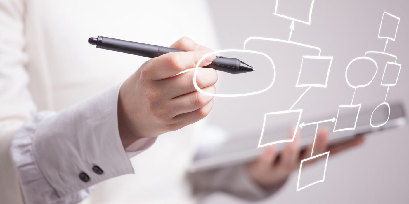 Businesswoman drawing flowchart, business process concept on grey background.