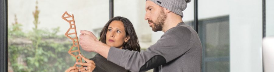 Architects inspecting the profile of an Argeton façade element