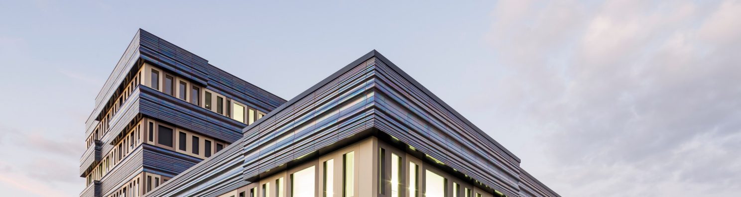 Reconversion and extension, including the premises of the GRED in a unique building which associates with the spaces of research for the premises of education (teaching), amphitheaters, a tree nursery of company and common premises. Differents elements of terracotta enamelled black iridescent are combined. CRBC, 26 place Henri Dunant 63000 CLERMONT FERRAND. Panels Argeton Double Peau Pétrole.
